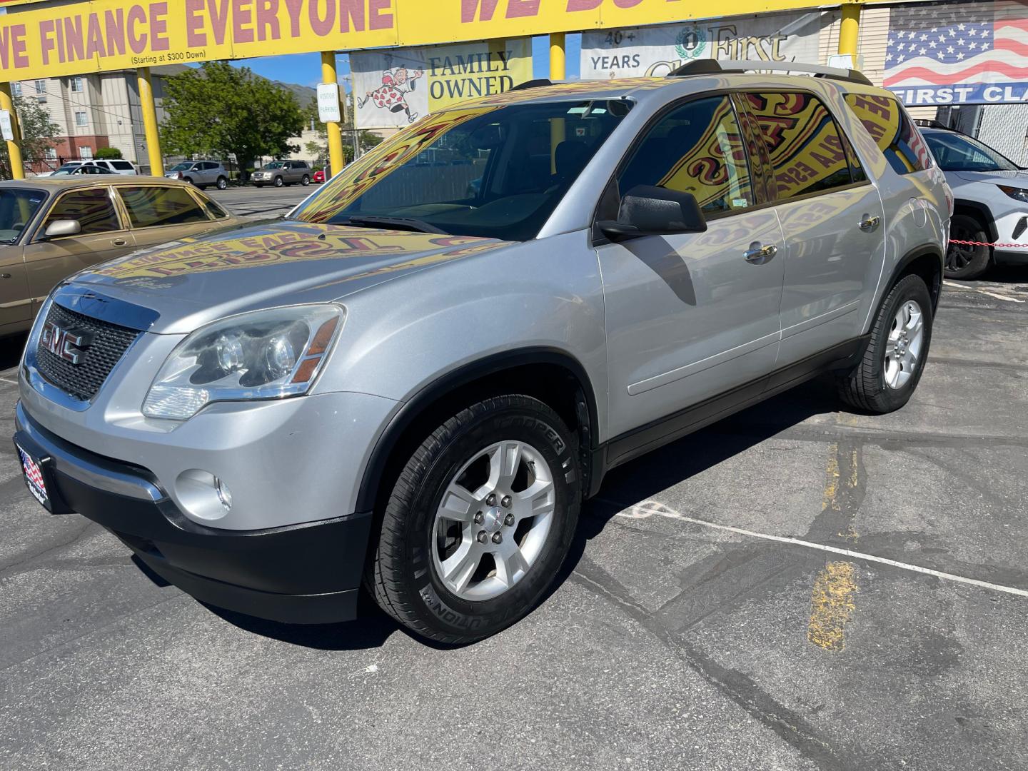 2011 Silver Sky Metallic /Black GMC Acadia SLE (1GKKRPED6BJ) with an 3.6L V6 engine, Automatic transmission, located at 801 South State Street, Salt Lake City, UT, 84111, (801) 328-0098, 40.751953, -111.888206 - Features Top Features: 3 rd Row Seating, Alloy Wheels, Preferred Package, Bluetooth Technology, Rear Air Conditioning, Cloth Seats, Rear View Camera, Fold-Away Third Row, Remote Start, Parking Sensors, Satellite Radio Ready, Power Hatch/Deck Lid, Third Row Seat Basic Features: ABS Brakes, Auxiliar - Photo#0